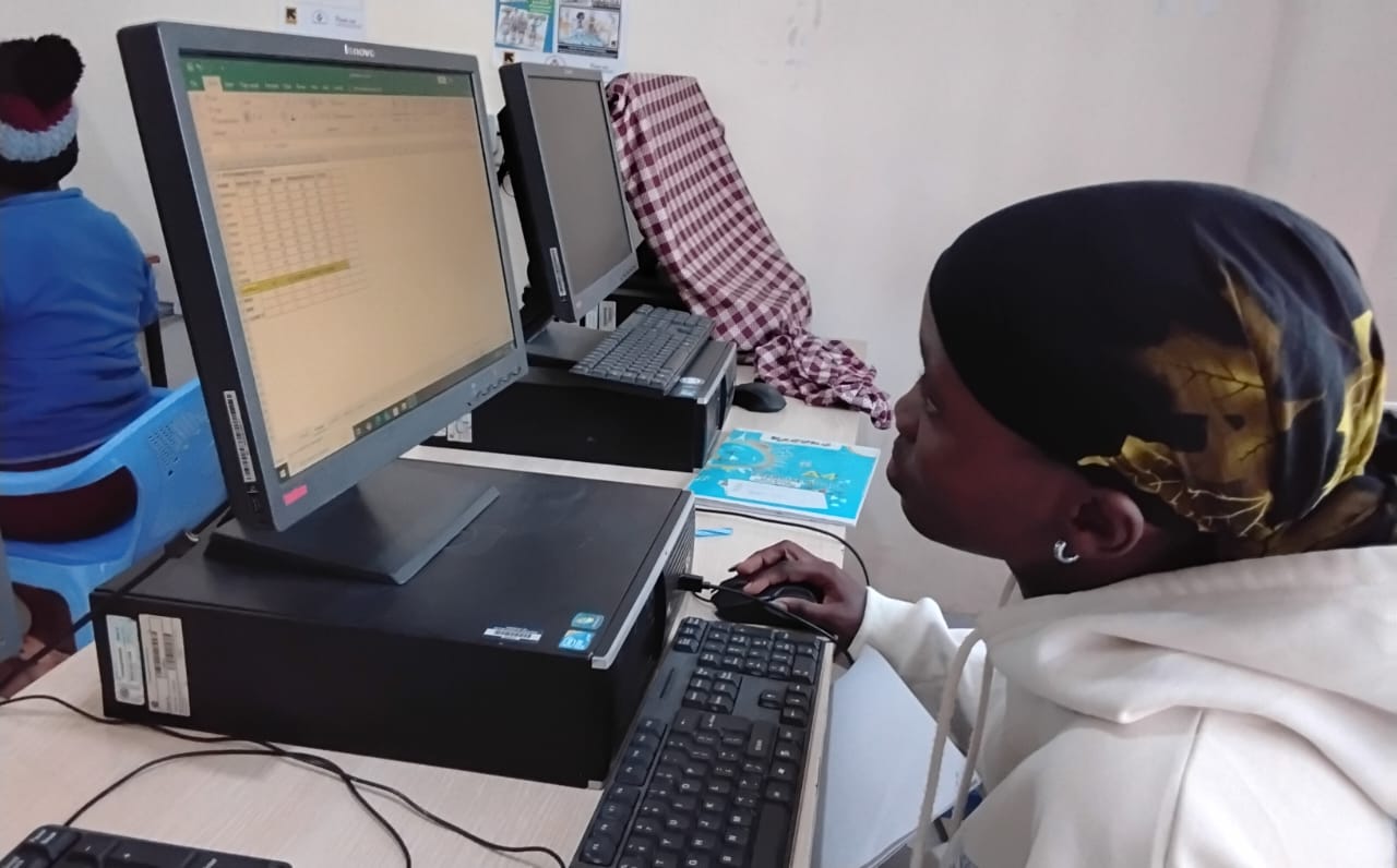 Student in digital literacy and computer training