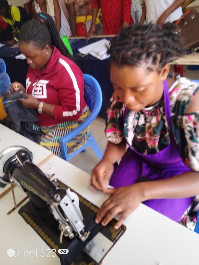 Tailoring instructor demonstrating pattern cutting techniques